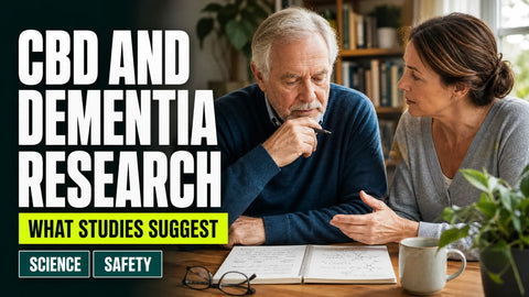 An older adult and caregiver review research notes together at a table in a softly lit home interior.